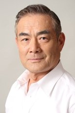 辻万长